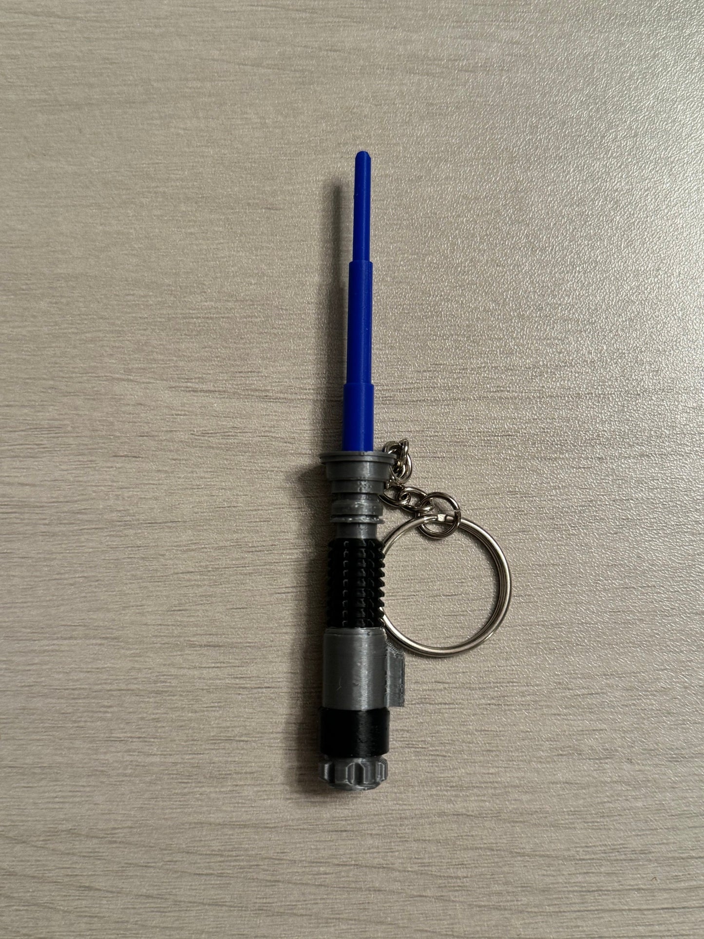Compact Lightsaber Keychain - Be Prepared for Any Battle